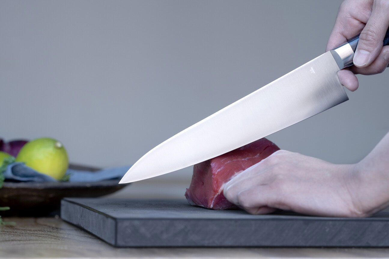 A <i>gyuto</i> (Western-style chef knife) is ideal for cutting meat. (Photo: KAMA-ASA)