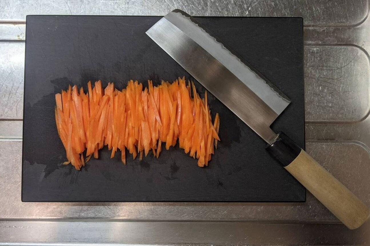 The rectangular <i>nakiri</i> is used for chopping vegetables. (Photo: KAMA-ASA)