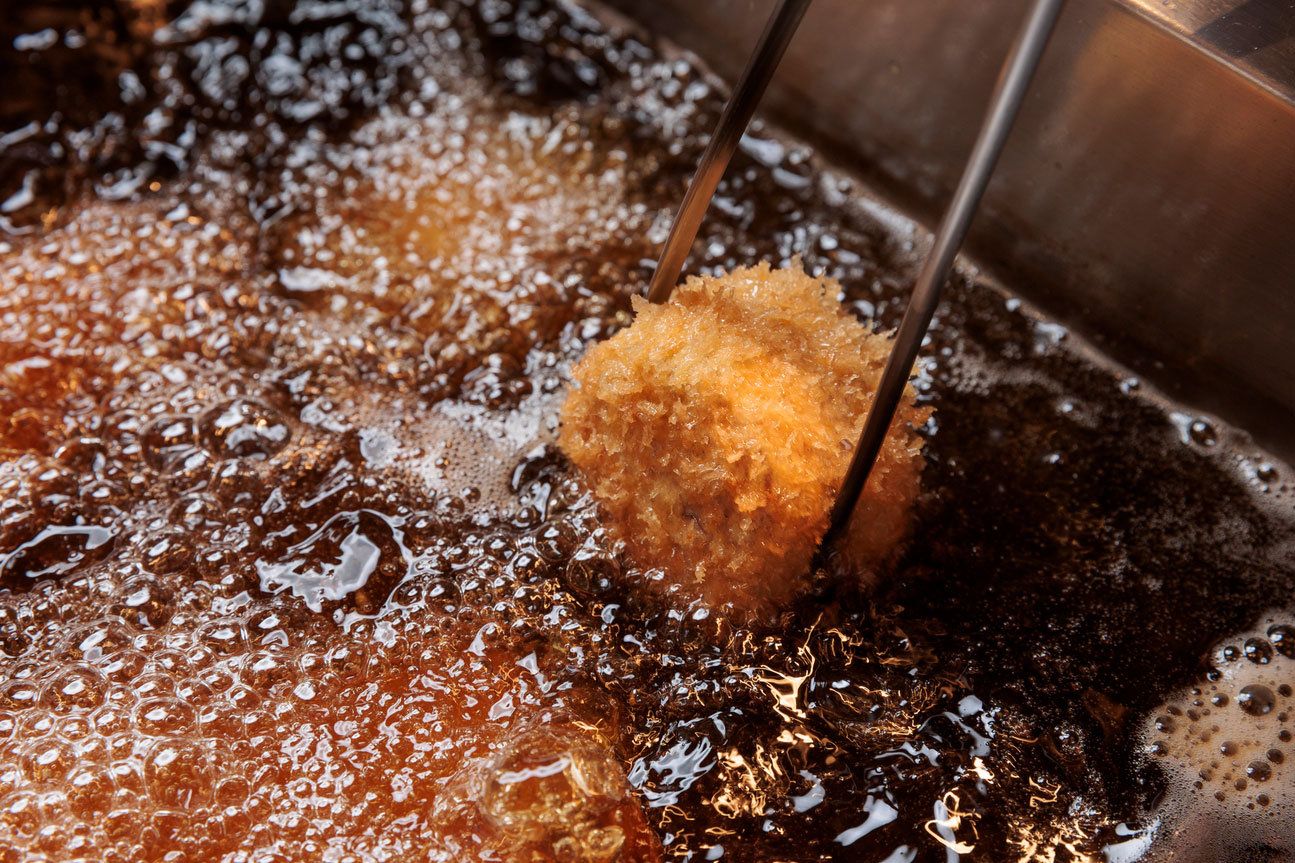 Breading, frying, and slicing a lean Dorobuta filet tonkatsu