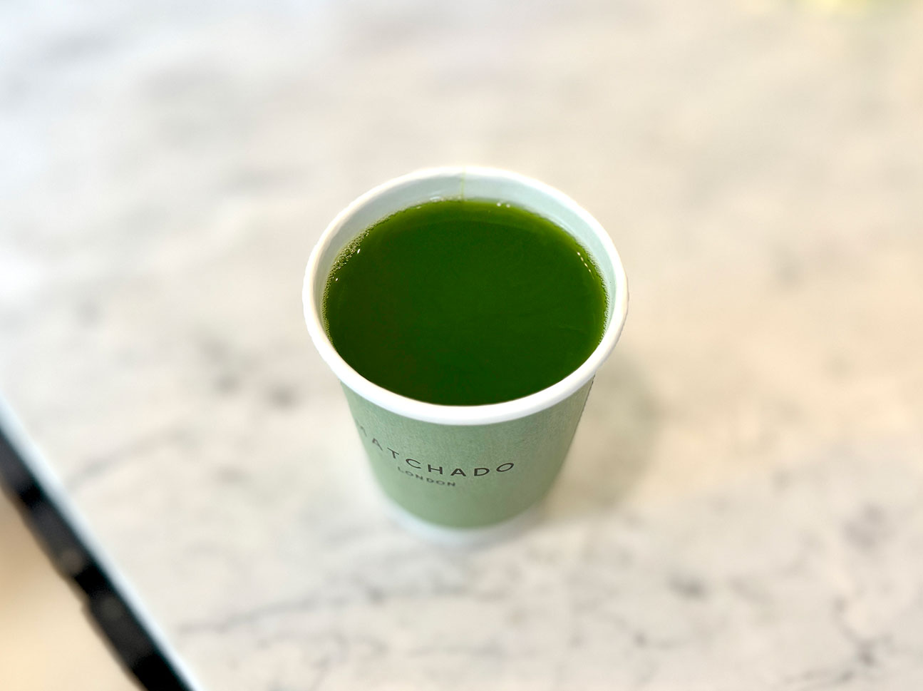 The vibrant, deep green of MATCHA TEA is striking, reflecting its exceptional quality.